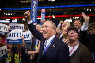 Scott Romney, older brother of Republican Presidential candidate Mitt Romney, cheers at The Republican National Convention in Tampa. (Photo by Brooks Kraft LLC/Corbis via Getty Images)