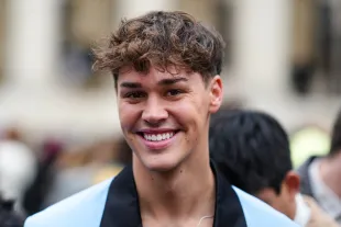PARIS, FRANCE - JANUARY 19: Noah Beck is seen, outside AMI, during Paris Fashion Week - Menswear F/W 2022-2023, on January 19, 2022 in Paris, France. (Photo by Edward Berthelot/Getty Images)