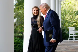 WASHINGTON, DC - OCTOBER 14: Erika Kirk (L), wife of late conservative activist Charlie Kirk, arrives with U.S. President Donald Trump as he posthumously awards the Presidential Medal of Freedom to Charlie Kirk during a ceremony in the Rose Garden of the White House on October 14, 2025 in Washington, DC. Today marks the National Day of Remembrance for Charlie Kirk who was shot and killed on September 10th at Utah Valley University. (Photo by Kevin Dietsch/Getty Images)