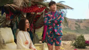 Maya Rudolph and Joel Kim Booster in Apple TV's Loot Season 3.