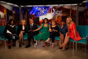 NEW YORK - SEPTEMBER 24:  (AFP OUT) (L-R) Whoopi Goldberg, Barbara Walters, U.S. President Barack Obama, first lady Michelle Obama, Joy Behar, Sherri Shepherd, Elisabeth Hasselbeck pose for a photo on the set of The View on ABC-TV September 24, 2012 in New York City. Obama is in New York to attend the United Nations General Assembly.  (Photo by Allan Tannenbaum-Pool/Getty Images)