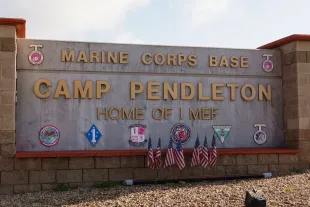 A sign at the entrance to Marine Corps Base Camp Pendleton on March 28, 2025 in Oceanside, California. (Photo by Kevin Carter/Getty Images)