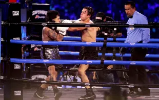 MEXICO CITY, MEXICO - AUGUST 17: Westcol and Mario Bautista fight performs as a part of 'Supernova Strikers 2025' at Palacio de los Deprotes on August 17, 2025 in Mexico City, Mexico. (Photo by Medios y Media/Getty Images)