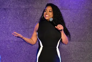 Sherri Shepherd performs onstage during her comedy tour (Image via Getty)