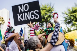 A No Kings protester, identified as a Nathan Hale Elementary School teacher, has garnered online hate for allegedly mocking Charlie Kirk'e assassination [Representational Image] (Image via Jay L Clendenin/Getty Images)
