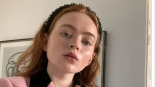 A close-up of Sadie Sink selfie shows the actor in a pink jacket . Image via Instagram/@sadiesink_.