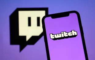 ANKARA, TURKEY - OCTOBER 6: The logo of "Twitch" is displayed on a smartphone in Ankara, Turkey on October 6, 2021. (Photo by Hakan Nural/Anadolu Agency via Getty Images)