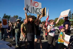 THOUSAND OAKS, CA - OCTOBER 18: Demonstrators participate in the second "No Kings" protest on October 18, 2025 in Thousand Oaks, California. Organizers expect millions to participate in cities and towns across the nation for the second "No Kings" protest to denounce the Trump administration. (Photo by Kevin Carter/Getty Images)