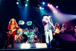 RAINBOW THEATRE  Photo of Allen COLLINS and Gary ROSSINGTON and LYNYRD SKYNYRD and Ronnie Van ZANT and Steve GAINES, L-R Allen Collins, Ronnie Van Zant, Gary Rosssington and Steve Gaines performing on stage  (Photo by Ian Dickson/Redferns)