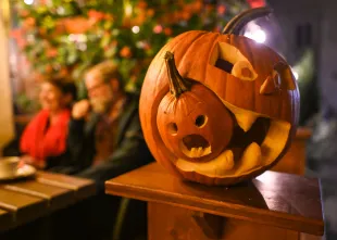 Jack-o'-lantern can be seen in front of a restaurant in the Old Town of Krakow.Although more and more Poles have been celebrating Halloween for several years, celebrating this holiday is more associated with selling pumpkins and costumes for children in chain stores, decorating some shop windows and restaurants, and often with themed parties in bars and clubs.As Halloween is not part of the Polish tradition, it is not really celebrated and only a few people will dress up on this day and join the party in big cities, including tourists and foreign students.On Sunday, October 30, 2022, in Krakow, Lesser Poland Voivodeship, Poland. (Photo by Artur Widak/NurPhoto via Getty Images)