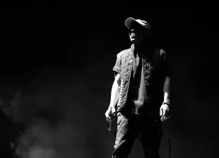 LOS ANGELES, CA - NOVEMBER 13:  (EDITOR NOTE: This image has been converted to black and white.) Anderson .Paak of Anderson .Paak & The Free Nationals performs on Camp Stage during day two of Tyler, the Creator's 5th Annual Camp Flog Gnaw Carnival at Exposition Park on November 13, 2016 in Los Angeles, California.  (Photo by Mike Windle/Getty Images)