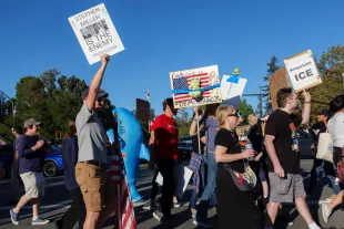 Demonstrators participate in the second "No Kings" protest on October 18, 2025 in Thousand Oaks, California. Organizers expect millions to participate in cities and towns across the nation for the second "No Kings" protest to denounce the Trump administration. (Photo by Kevin Carter/Getty Images)
