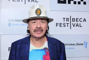 Carlos Santana has not responded to the ongoing rumors until now (Image via Getty)