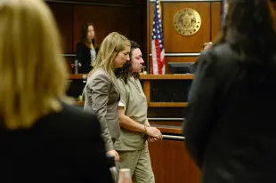 BOULDER, CO - APRIL 29:Dynel Lane walks with Defense attorney Kathryn Herold after being sentenced to 100 years in prison at the Boulder County Justice Center on Friday, April 29, 2016. (Photo by Matthew Jonas/MediaNews Group/Longmont Times-Call via Getty Images)"nMatthew Jonas/Staff Photographer April 29, 2016