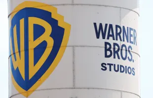 The Warner Bros. logo is displayed on a water tower at Warner Bros. Studio on September 12, 2025 in Burbank, California. Media giant Paramount Skydance is reportedly preparing a bid to purchase Warner Bros. Discovery, including its movie studio and cable networks. (Photo by Mario Tama/Getty Images)