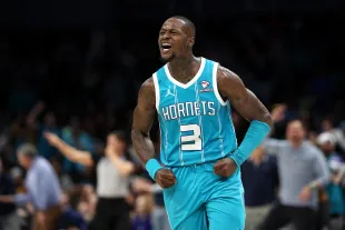 CHARLOTTE, NORTH CAROLINA - DECEMBER 11: Terry Rozier #3 of the Charlotte Hornets reacts following a three point basket during the second half of their game against the Miami Heat at Spectrum Center on December 11, 2023 in Charlotte, North Carolina. NOTE TO USER: User expressly acknowledges and agrees that, by downloading and or using this photograph, User is consenting to the terms and conditions of the Getty Images License Agreement. (Photo by Jared C. Tilton/Getty Images)
