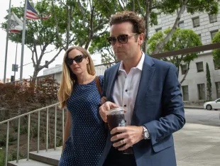 Actor Danny Masterson arrives at Clara Shortridge Foltz Criminal Justice Center in Los Angeles, CA on Wednesday, May 31, 2023 with then-wife Bijou Phillips for his retrial for allegedly raping three women between 2001 and 2003. (Myung J. Chun / Los Angeles Times via Getty Images)