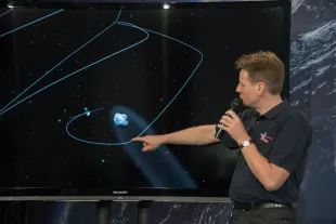 ESA orbital mechanics specialist Frank Budnik talks to the press at the European Space Operations Center of the European Space Agency in Darmstadt, Germany, 06 August 2014, on occasion of Rosetta spacecraft completing successfully its orbit insertion with comet 67P/Churyumov-Gerasimenko. After a decade-long journey through space, ESA's Rosetta has become the first spacecraft in history to rendezvous with a comet. (Photo by Horacio Villalobos/Corbis via Getty Images)