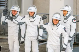 NASA astronauts commander Anne McClain and pilot Nichole Ayers, alongside mission specialists, JAXA (Japan Aerospace Exploration Agency) astronaut Takuya Onishi and Roscosmos cosmonaut Kirill Peskov exit the Neil A. Armstrong Operations and Checkout building at NASA Kennedy ahead of launch on March 14, 2025 in Cape Canaveral, Florida. The mission will be crewed by NASA astronauts commander Anne McClain and pilot Nichole Ayers, alongside mission specialists, JAXA (Japan Aerospace Exploration Agency) astronaut Takuya Onishi and Roscosmos cosmonaut Kirill Peskov. The SpaceX Falcon 9 rocket and Dragon spacecraft continue undergoing final preparations ahead of its launch later tonight.  (Photo by Brandon Bell/Getty Images)
