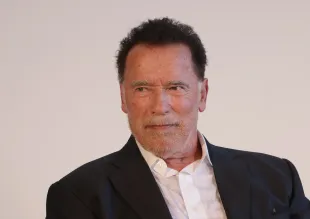 BERLIN, GERMANY - SEPTEMBER 17: Former California Governor Arnold Schwarzenegger speaks to students after he received an honorary degree from the Hertie School at an event at the Hertie School on September 17, 2024 in Berlin, Germany. The award is in honour of Schwarzenegger's commitment to climate protection and civil society.  (Photo by Sean Gallup/Getty Images)