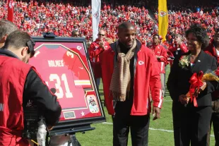 Kansas City Chiefs alumni Priest Holmes is honored during halftime at the New York Jets vs Kansas City Chiefs game at Arrowhead Stadium on November 2, 2014 in Kansas City, Missouri.  (Photo by Al Pereira/New York Jets/Getty Images)