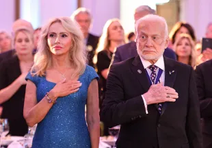 YORBA LINDA, CA - JULY 23: Buzz Aldrin and his girlfriend, Anca Faur, stand during the National Anthem during a dinner commemorating the 50th anniversary of Apollo 11"u2019s return to Earth at the Richard Nixon Presidential Library and Museum in Yorba Linda, CA, on Tuesday, July 23, 2019. The Nixon Foundation awarded Aldrin "The Richard Nixon Greatest Comeback Award" crew's splashdown return following the moon landing.  (Photo by Jeff Gritchen, Orange County Register/SCNG)