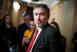 WASHINGTON, DC - FEBRUARY 25: U.S. Rep. Thomas Massie (R-KY) speaks to reporters as she arrives for a House Republican caucus meeting at the U.S. Capitol on February 25, 2025 in Washington, DC. The House is working to pass its budget bill this week which includes up to $4.5 trillion in tax cuts, an increase in the debt limit and cuts Medicaid and other social programs. (Photo by Andrew Harnik/Getty Images)