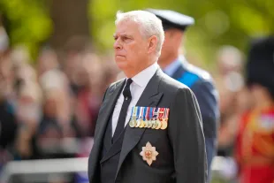LONDON, ENGLAND - SEPTEMBER 14: Prince Andrew, Duke of York walks behind the coffin during the ceremonial procession of the coffin of Queen Elizabeth II from Buckingham Palace to Westminster Hall on September 14, 2022 in London, United Kingdom. Queen Elizabeth II's coffin is taken in procession on a Gun Carriage of The King's Troop Royal Horse Artillery from Buckingham Palace to Westminster Hall where she will lay in state until the early morning of her funeral. Queen Elizabeth II died at Balmoral Castle in Scotland on September 8, 2022, and is succeeded by her eldest son, King Charles III. (Photo by Martin Meissner - WPA Pool/Getty Images)