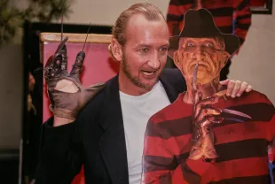 American actor Robert Englund posing with a cardboard cut-out of Freddy Krueger at the premiere of 'Freddy's Dead: The Final Nightmare' at Mann's Chinese Theatre in Los Angeles, California, September 11th 1991. (Photo by Vinnie Zuffante/Getty Images)