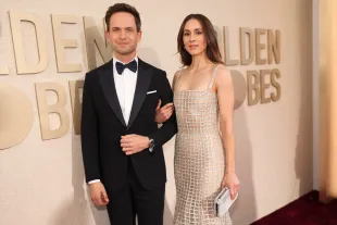 Patrick J. Adams and Troian Bellisario at the 81st Golden Globe Awards held at the Beverly Hilton Hotel on January 7, 2024 in Beverly Hills, California. (Photo by Christopher Polk/Golden Globes 2024/Golden Globes 2024 via Getty Images)