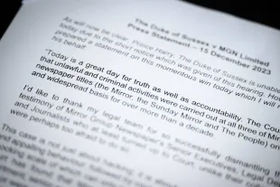 LONDON, ENGLAND - DECEMBER 15: A detail view of a printed copy of a written statement by Prince Harry which was distributed to the media following the ruling in his favour in a lawsuit against the Mirror Group on December 15, 2023 in London, England. Prince Harry won £140,600 in damages for privacy breaches from Mirror Group Newspapers in a High Court lawsuit that ruled phone hacking and unlawful information gathering took place between 1996 and 2011. Other claimants in the case include Cheryl, Ian Wright, the estate of George Michael, and Ricky Tomlinson. (Photo by Leon Neal/Getty Images)