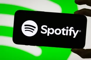 Spotify faces a fresh legal challenge (Photo illustration by Cheng Xin/Getty Images)