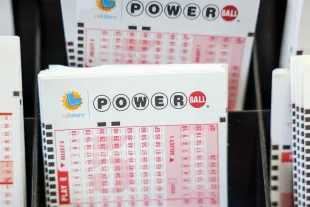 Hawthorne, CA - October 10: Powerball play tickets on display at Blue Bird Liquor in Hawthorne, CA, Tuesday, Oct. 10, 2023. The estimated jackpot for tonight's Powerball drawing is $1.73 Billion.(Jay L. Clendenin / Los Angeles Times via Getty Images)