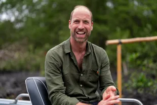 RIO DE JANEIRO, BRAZIL - NOVEMBER 4: Prince William, Prince of Wales smiles as he rides in a boat during a tour of the Guapimirim mangrove area in Guanabara Bay, which is managed by the Chico Mendes Institute for Biodiversity Conservation (ICMBio), to learn about the restoration work taking place there, on day two of his visit to Brazil for the annual Earthshot Prize Awards on November 4, 2025 in Rio de Janeiro, Brazil. Prince William is undertaking a number of engagements related to the environment in Rio De Janeiro ahead of his attendance at the fifth annual Earthshot Prize awards ceremony. (Photo by Aaron Chown-Pool/Getty Images)