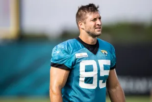 JACKSONVILLE, FLORIDA - JULY 30: Tim Tebow #85 of the Jacksonville Jaguars looks on during Training Camp at TIAA Bank Field on July 30, 2021 in Jacksonville, Florida. (Photo by James Gilbert/Getty Images)