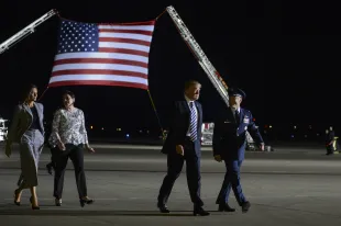 President of the United States Donald J Trump and First Lady Melania Trump walking with Col Casey D Eaton, 89th Airlift Wing commander and his wife Lisa Eaton, Joint Base Andrews, Maryland, May 10, 2018. Image courtesy Staff Sgt. Kenny Holston / 89th Airlift Wing. (Photo by Smith Collection/Gado/Getty Images)