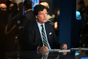 HOLLYWOOD, FLORIDA - NOVEMBER 17: Tucker Carlson speaks during 2022 FOX Nation Patriot Awards at Hard Rock Live at Seminole Hard Rock Hotel & Casino Hollywood on November 17, 2022 in Hollywood, Florida. (Photo by Jason Koerner/Getty Images)