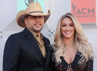 LAS VEGAS, NEVADA - APRIL 03: Musician Jason Aldean and Brittany Kerr arrive at the 51st Academy Of Country Music Awards at MGM Grand Garden Arena on April 3, 2016 in Las Vegas, Nevada.  (Photo by Gregg DeGuire/WireImage)