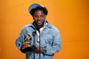 LOS ANGELES, CALIFORNIA - FEBRUARY 02: Kendrick Lamar accepts the Record of the Year award for "Not Like Us" onstage during the 67th Annual GRAMMY Awards at Crypto.com Arena on February 02, 2025 in Los Angeles, California.  (Photo by Kevin Mazur/Getty Images for The Recording Academy)