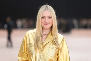 PARIS, FRANCE - MARCH 11: (EDITORIAL USE ONLY - For Non-Editorial use please seek approval from Fashion House) Dakota Fanning attends the Chanel Womenswear Fall/Winter 2025-2026 show as part of Paris Fashion Week at Grand Palais on March 11, 2025 in Paris, France. (Photo by Pascal Le Segretain/Getty Images)