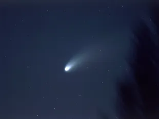 The Comet Hale-Bopp passes across the night sky, 1997. (Photo by Space Frontiers/Hulton Archive/Getty Images)