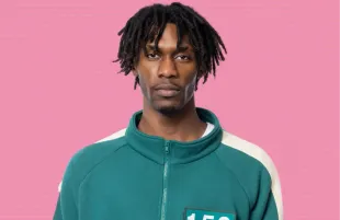 Player 152 from Squid Game: The Challenge Season 2 (Image via Tudum by Netflix)