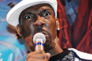 Comedian Charlie Murphy speaks at the Sony PlayStation 3 Launch Party at the Sony Style Store (Image via Getty)