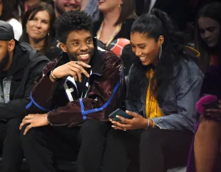 CHICAGO, ILLINOIS - FEBRUARY 16: Chadwick Boseman (L) and Taylor Simone Ledward attend the 69th NBA All-Star Game at United Center on February 16, 2020 in Chicago, Illinois. (Photo by Kevin Mazur/Getty Images)