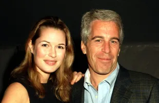 Celina Midelfart and American socialite Jeffrey Epstein (1953 - 2019) as they pose together during a reception at the Mar-a-Lago estate, Palm Beach, Florida, February 22, 1997. (Photo by Davidoff Studios/Getty Images)