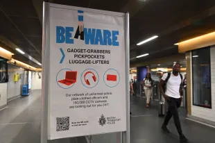 LONDON, UK - AUGUST 18: Warning signs placed at subway stations by the British Transport Police informing passengers to be cautious against pickpockets and electronic device thieves in London, United Kingdom on August 18, 2025. (Photo by Rasid Necati Aslim/Anadolu via Getty Images)