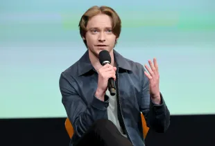 Backlash erupts online as Canadian actor Calum Worthy's 2Wai app introduces new AI feature. (Image by Kevin Winter/Getty Images)