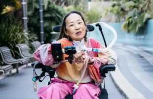 Alice Wong posing for a picture (Image via Instagram/@disability_visibility)