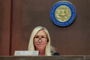 WASHINGTON, DC - FEBRUARY 26: Chair of the Subcommittee on Delivering On Government Efficiency (DOGE) U.S. Rep. Marjorie Taylor Greene (R-SC) presides over a hearing of the House Oversight Subcommittee in the U.S. Capitol on February 26, 2025 in Washington, DC. The subcommittee held the hearing to hear from witnesses on U.S. foreign aid.  (Photo by Anna Moneymaker/Getty Images)