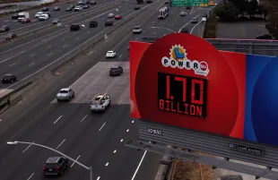EMERYVILLE, CALIFORNIA - SEPTEMBER 04: In an aerial view, a billboard shows the Powerball lottery prize at $1.7 billion on September 04, 2025 in Emeryville, California. The Powerball jackpot climbed to $1.7 billion after Monday's draw produced no winning numbers. (Photo by Justin Sullivan/Getty Images)